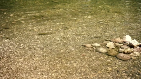 Close up video of crystal clear turquoise water on the shallows of Lake Bohin Vidéo 330585363
