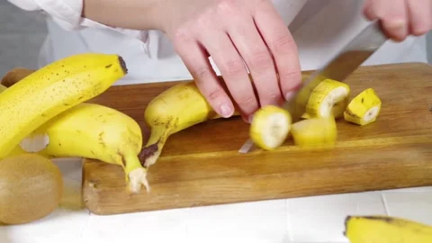Close-up video of cutting bananas Stock Footage 170434758