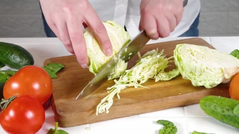 Close-up video of cutting cabbage Stock Footage 170434703