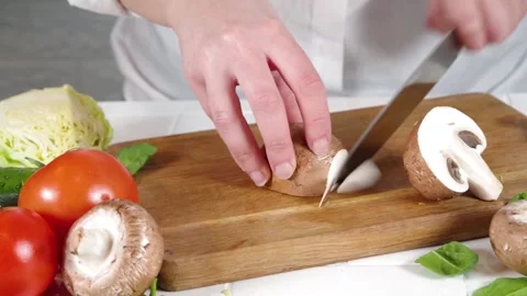 Close-up video of cutting mushrooms Stock-Footage 170434704