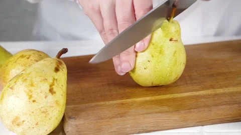 Close-up video of cutting pear Video stock 170434711