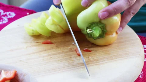 Close-up video of cutting pepper for simmering Vegetable Stew Stock Footage 341914026