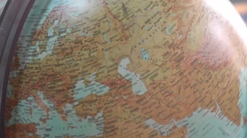 Close-up video of the didactic use of the rotating globe Stock Footage 241104592