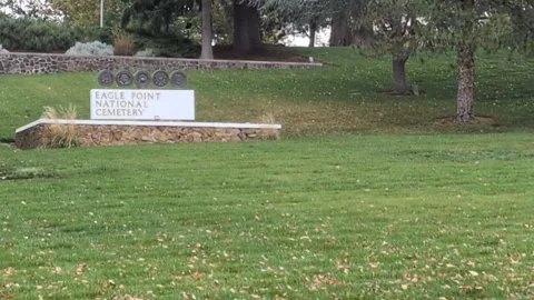 Close-up video of the “Eagle Point National Cemetery” sign Stock-Footage 321259277