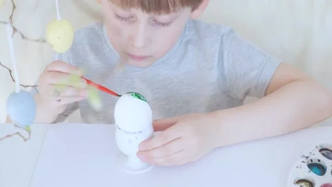 Close up video of the egg painting process. Stock Footage 149870974