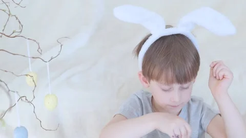 Close up video of the egg painting process.  Stock Footage 149870977