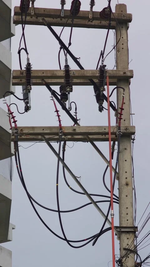 Close up video of engaging high voltage drop out fuse cutouts on a concrete. Stock Footage 338298361