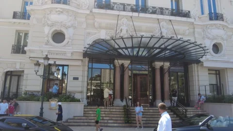 This close-up video focuses on the front gate door of the Hotel de Paris in Stock Footage 280930744