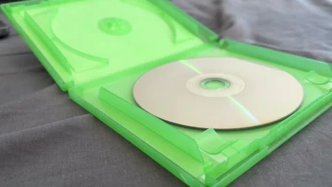 Close Up of Video Game Disc Case on Table Representing Physical Gaming Media Stock Footage 337457309