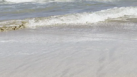 Close Up Video of Gentle Waves on a Sandy Beach 스톡 동영상 321198408