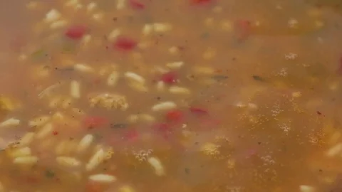 Close video of heating gumbo soup Stock Footage 75649125