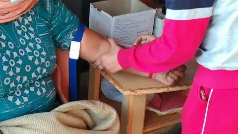 Close up video of a lab technician taking the sample of blood. Stock Footage 144053996