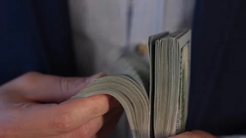 Close up video of man counting dollar banknotes, money calculation. Personal Stock Footage 287198028