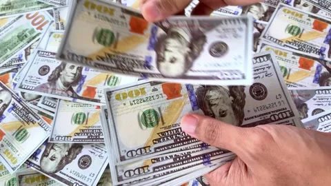 Close up video of man counting dollar banknotes, money calculation. Stock Footage 306226884