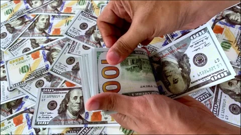 Close up video of man counting dollar banknotes, money calculation. Stock Footage 306226990