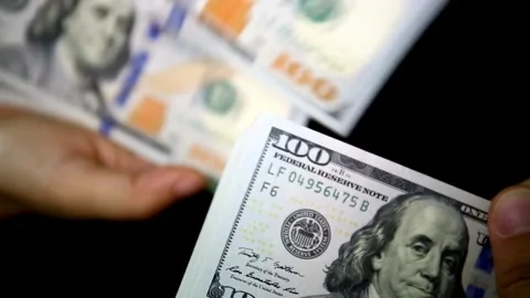Close up video of man counting hundred dollar money by hands. Money in 100 .. Stock Footage 266476216