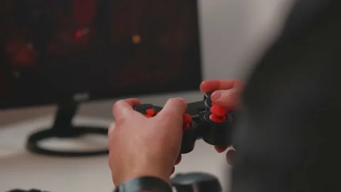Close up video of man playing games online with joystick Stock Footage 171209612