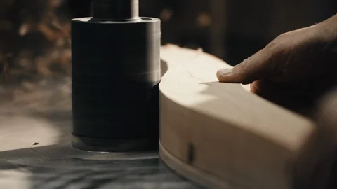 Close up video of Man's Hands working with Piece of Furniture and a Lathe. Видео 125909068