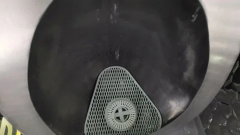 Close up video of modern urinal Stock Footage 221837379