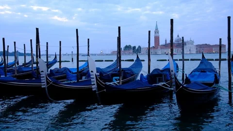 Close up video of moored gondolas on San Marco Square in Venice, Italy. Venic Stock Footage 99453311