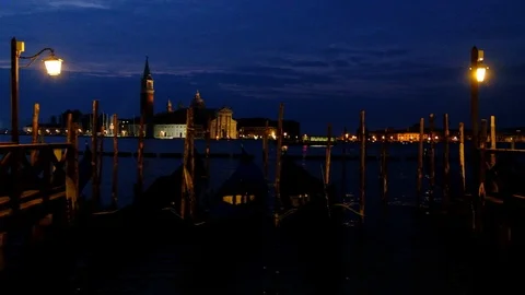 Close up video of moored gondolas on San Marco Square in Venice, Italy. Venic Stock Footage 99453328