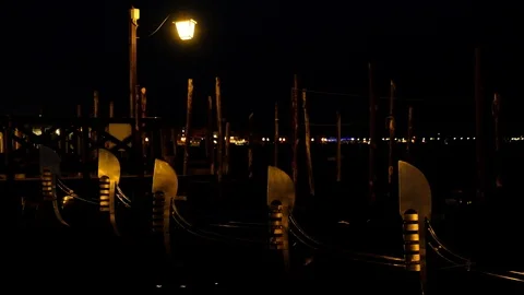 Close up video of moored gondolas on San Marco Square in Venice, Italy. Venic Stock Footage 99453330