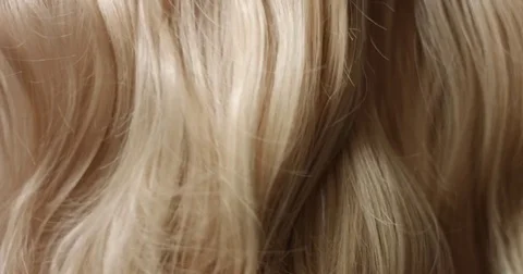 Close up video or woman's blond hair Stock Footage