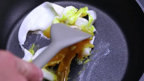 Close-up video of a pan-cooked scrambled egg Stock Footage 253610430