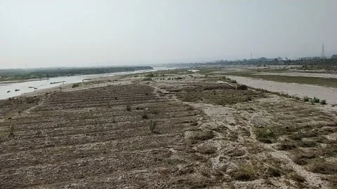 Close up video of polluted river water and unused land in the river bed. Stock Footage 144912046