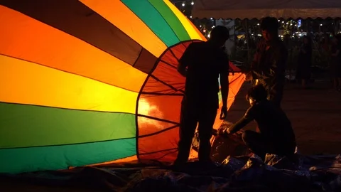 Close up video of propane gas fire burner in colorful hot air balloons Stock Footage 125612382