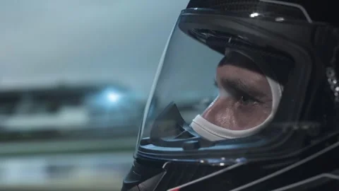 Close-up video of racing driver in motion. Stock Footage 313115124