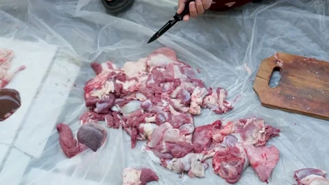 Close-up video of raw meat cutting with a knife. eid adha qurban Stock Footage 201182507