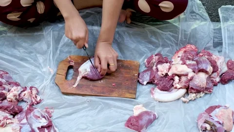 Close-up video of raw meat cutting with a knife. eid adha qurban Stock Footage 201182587