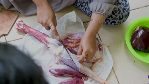 Close-up video of raw meat cutting with a knife. eid adha qurban Stock Footage 201182734
