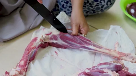 Close-up video of raw meat cutting with a knife. eid adha qurban Stock Footage 201182746