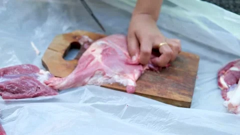 Close-up video of raw meat cutting with a knife. eid adha qurban Stock Footage 201182948