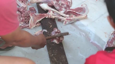 Close-up video of raw meat cutting with a knife. eid adha qurban Stock Footage 201182959