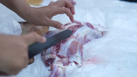 Close-up video of raw meat cutting with a knife. eid adha qurban Stock Footage 201183027