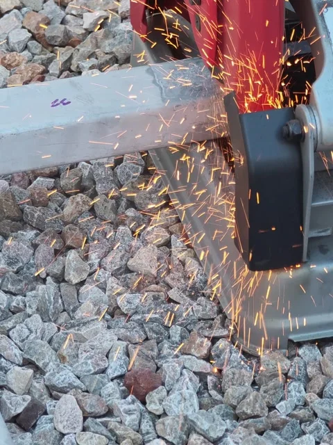 Close up video of red electric chop saw machine cutting square steel pipe  Video stock 338175342