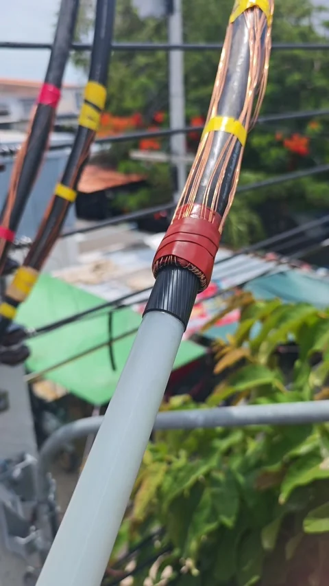 Close up video of red mastic sealant tape wrapped on the copper wire screen. Видео 340278058