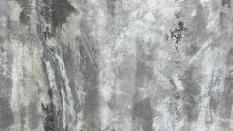 Close-up video of rugged concrete wall with weathered texture Stock Footage 318711519