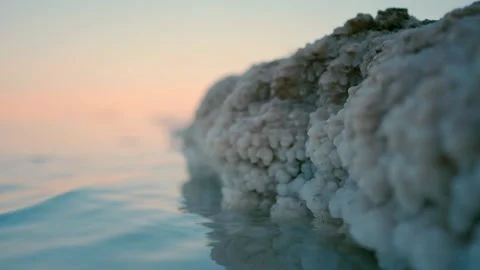 Close-up video of salt crystals in the Dead Sea at sunset. Stock Footage 236239555