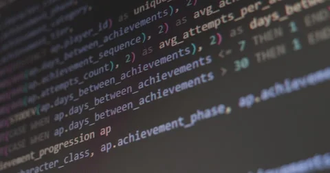 Close up video of scrolling abstract SQL game development code Stock Footage 323540914
