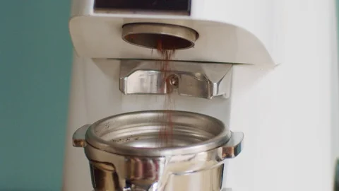 Close up video shot of coffee-grinder in process of making ground drink  Stock Footage 116410055