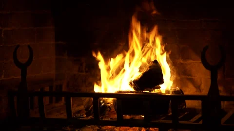Close up video shot of fire burning in vintage Fireplace Stock Footage 285543783