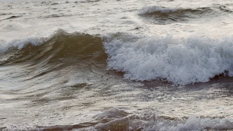Close up video shot of raging ocean waves with white foam close up slow motion.  Stock Footage 112757327