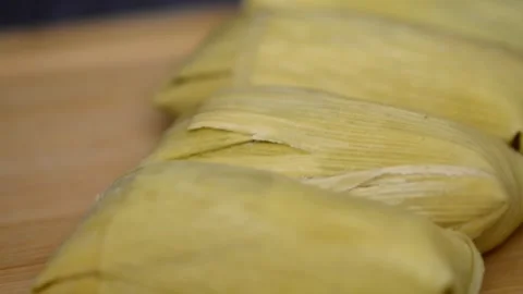 A close-up video showcases Central American, latina American tamales wrappe.. Video stock 272744751