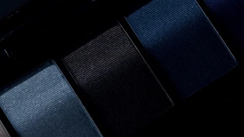 Close-up video showcases a rotating professional makeup eyeshadow palette Stock Footage 258655688
