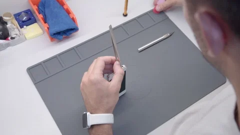 Close-up video showing process of mobile phone repair Stock Footage 91335286