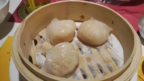 This close up video shows a delicious dish of shrimp dumpling ha gow with a d Stock Footage 196899990